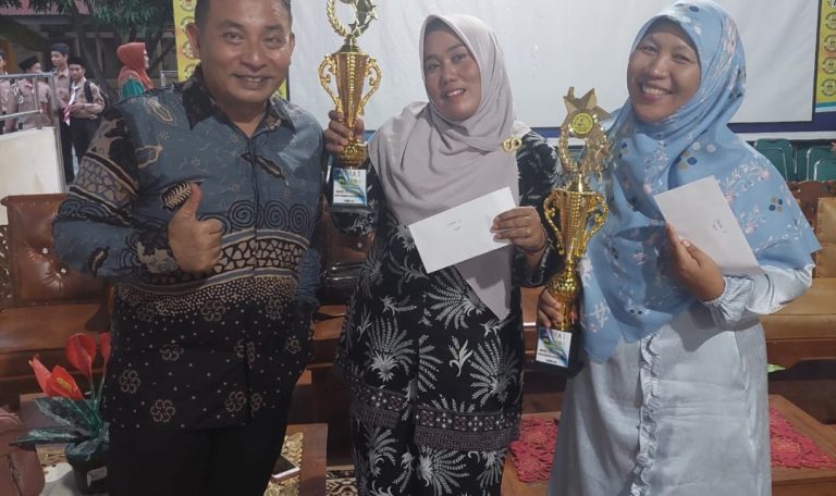 Nurjamilah Guru MTsN 1, Juara 3 Pra OGN Tingkat Kota Padang